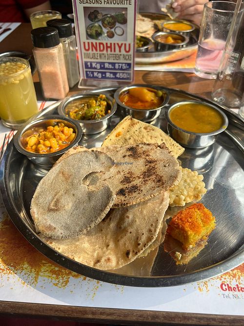 Vegan thali. There are three starters underneath the 3 different rotis.
Also missing is the dhal and rice that comes after the starter and mains as well as the deserts  at Chetana Veg. Restaurant & Bar (1946) in Mumbai