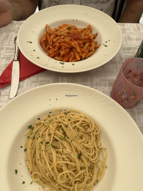 Spaghetti and garlic; rigatoni in their marinara sauce   at Ristorante Convivio in Venice