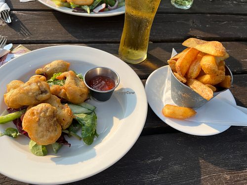 Starter of vegan tempura mushrooms with a side of chips at Hare Arms in Kings Lynn
