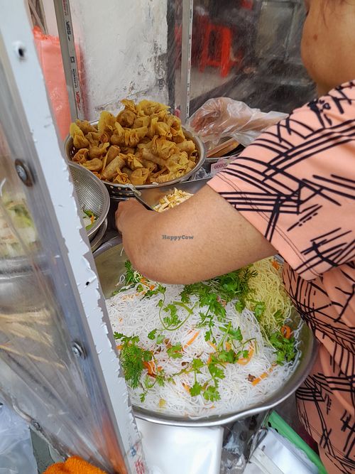 The lady preparing my take away vegan food at Xao Chay in Ho Chi Minh City