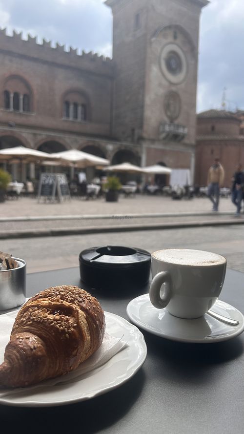 Vegan croissant with orange jam & soya milk cappuccino  at Bar Pasticceria Caravatti in Mantova