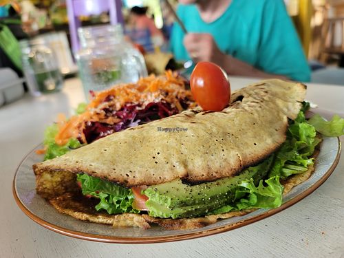 Lunch sandwich #2 With avocado, grilled veggies, sunflower seeds basil and olive oil  at Como En Mi Casa in Puerto Viejo De Talamanca