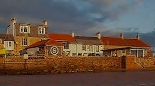 Picturesque seaside bar and restaurant serving seasonal dishes with local produce    at The Ship Inn  in Elie