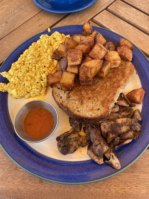 Breakfast plate with tofu scramble, ask for lion’s mane steak in place of sausage   at Borage  in Speedway