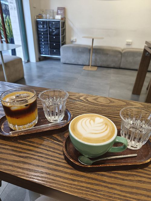 Americano with orange juice and Caramel Macchiato at The Beginning Coffee in Hanoi