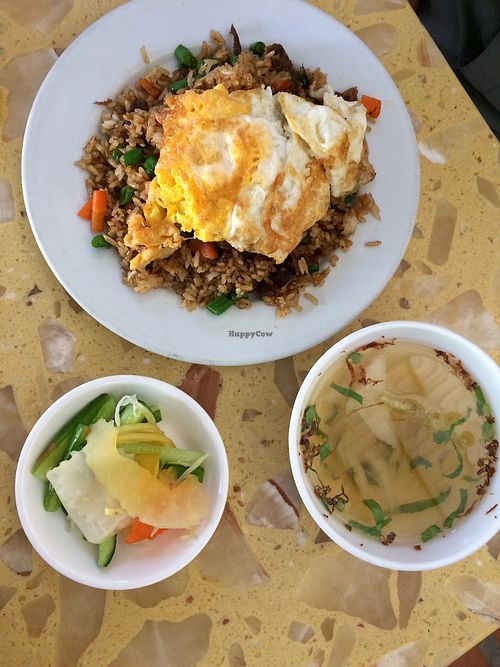 Fried rice comes with pickles and soup at Sir Si Pha in Kampong Cham
