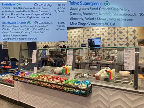 Counter, plus some vegan items on wall menu highlighted at Just Salad - Hunter College in New York City
