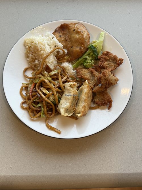 A plate of items we ordered; vegan steak, dry ribs, noodle and dumplings   at Happy Veggie House in Calgary