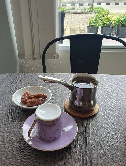 Arabic c
offee served with dates at The Juicery House in 