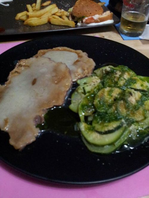 Escargo.. some seitan dish with white wine sauce. Wasn't especially impressive. The burgers in the back were all very tasty!! (Chickpea ones were a little salty) at Vegan Point in Alicante