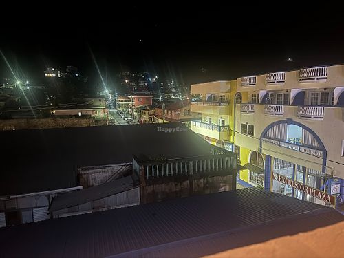 Relaxing open air rooftop view of Soufriere. at Felicity Rooftop Restaurant in Soufriere