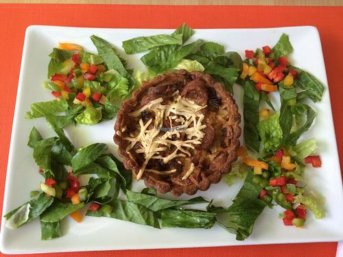 Vegan sausage and onion quiche  at Eden in Eden in Miami