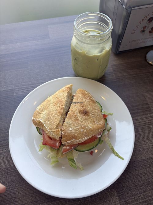 Large matcha with oat milk + The Hermit sandwich   at Community Cup Coffee  in Eugene