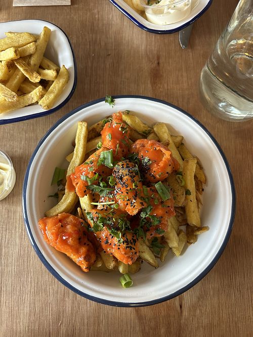 Buffalo cauliflower wings with chips and vegan aioli   at Little Fish Café in Galway