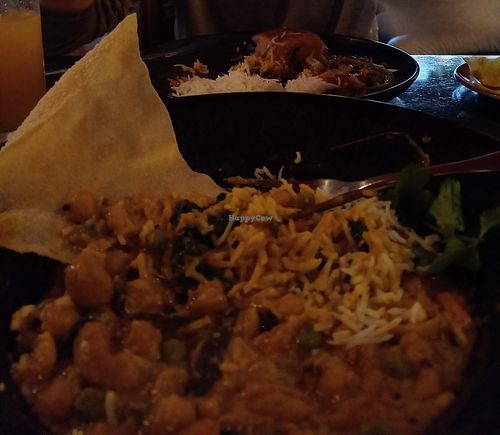 Chickpea curry with rice and poppadom. at Ravi's Bar and Restaurant in Clifden
