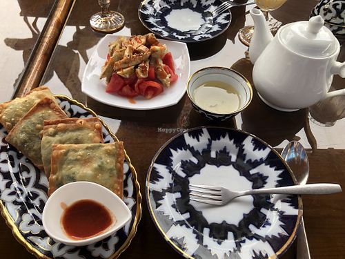 Eggplant salad, spinach bichak, and lemon tea!  at Chinar in Bukhara