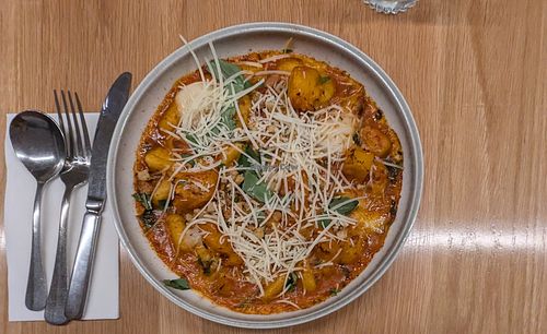 Oven baked potato gnocchi with pumpkin and vegan cheese at Rococo in Mordialloc