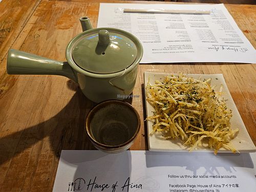 Tea and thin French fries that came with the ramen at House of Aina in Los Banos
