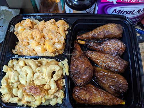 Drumsticks with sides of cauliflower & Mac & cheese at ELife in Washington
