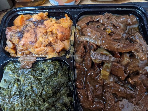 Stew with yams, spinach sides at ELife in Washington