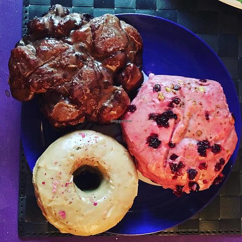 Apple fritter, a special vegan stuffy, and earl grey! at Cartems Donuts - Downtown in Vancouver