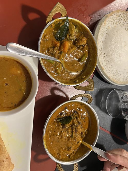 Vegetable curry, chickpea curry, sambal (for the dosa) and a rice flour bread.  at Urban Masala in Wellington