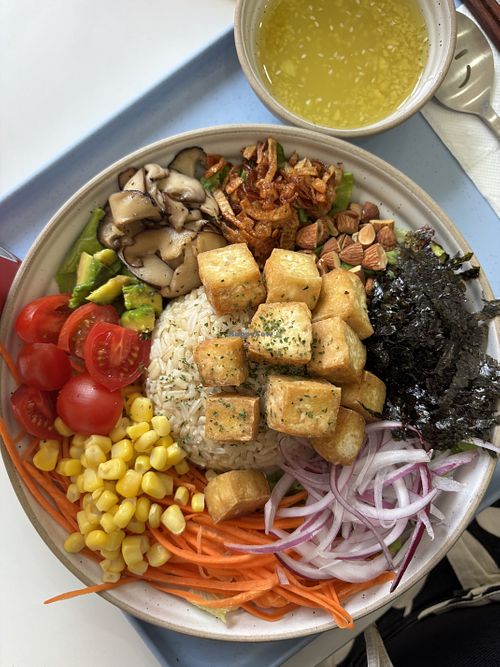 Tofu poke bowl - remove egg and swap to oriental dressing  at Café Le Petit Prince 2 in Luang Prabang