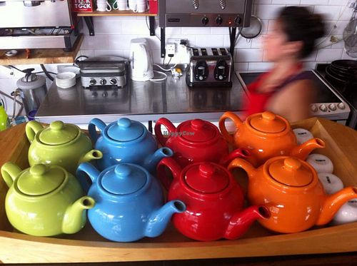 tea pots lined up in Cafe Joanna - expressing joy as the cafe and its soul food. PS: Don't forget to have a coffee, though! at Cafe Joanna in Bristol