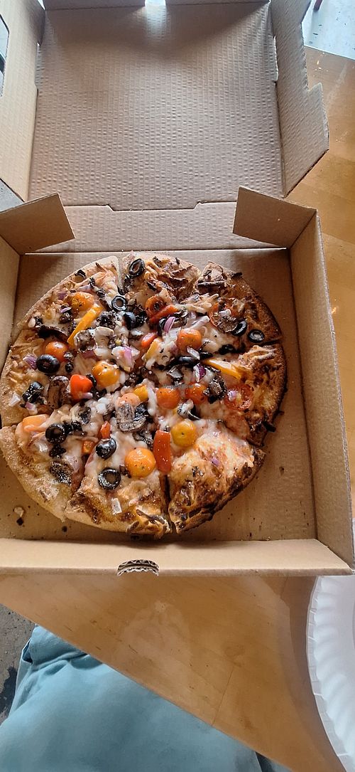 Fresh from the garden pizza made with Vegan cheese at Pour Folk Provisions Co in Lexington