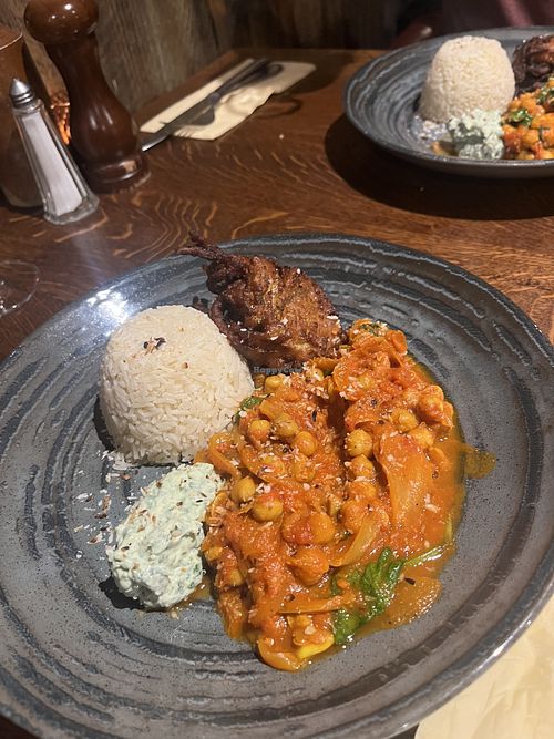 Chickpea curry with home made tofu yoghurt, chopped coconut rice and onion/samphire bhaji 🫶  at Ring O'Bells in Wirral