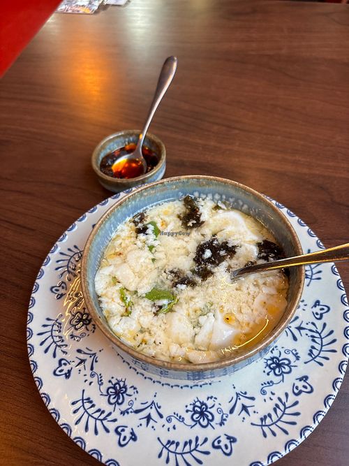 Tofu casero, homemade tofu from scratch. With their own chilli oil, con carotene picante casero  at Shambala - 烧饼阁 in Sevilla