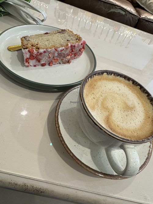 Oat latte with vegan summer fruit cake  at Richmonds in Newport