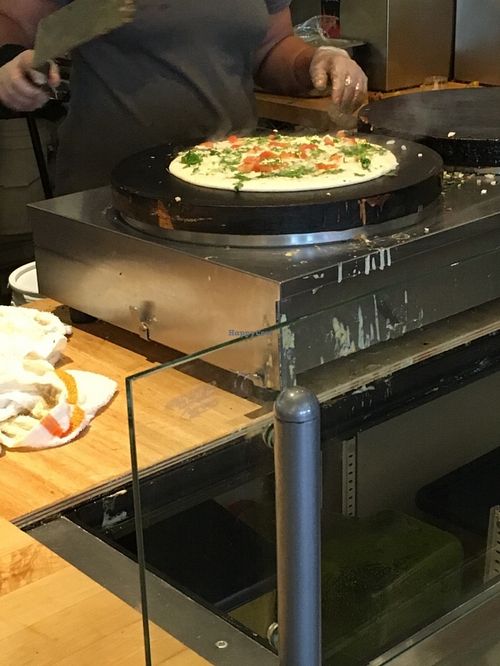 Cooking uttapam at DC Dosa - Kiosk in Washington