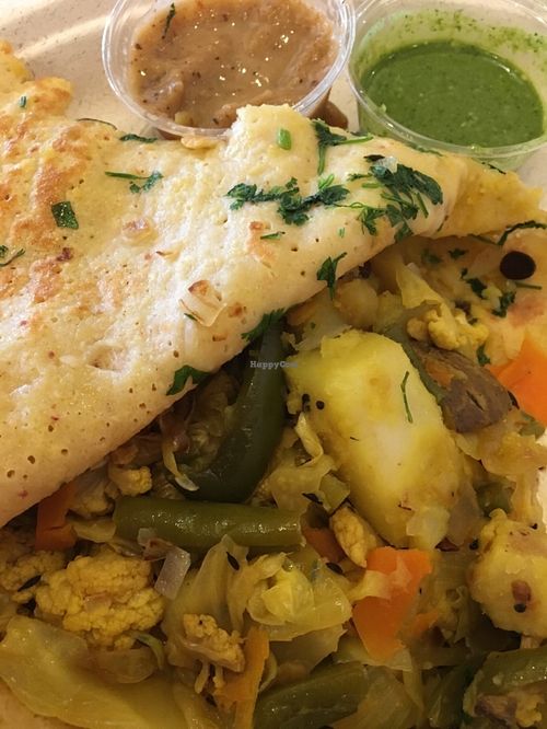 Yellow lentil dosa with cauliflower filling at DC Dosa - Kiosk in Washington