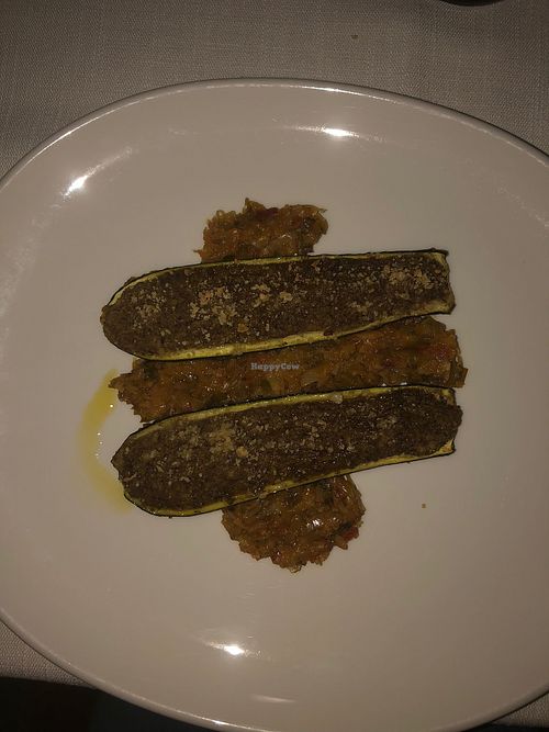 Zucchine ripiene di crema di lenticchie e anacardi su letto di porri. at Il Lughino in Seregno
