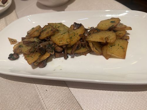 Potato with mushrooms and onions - side dish  at Joy Chaikhana Lounge  in Bukhara
