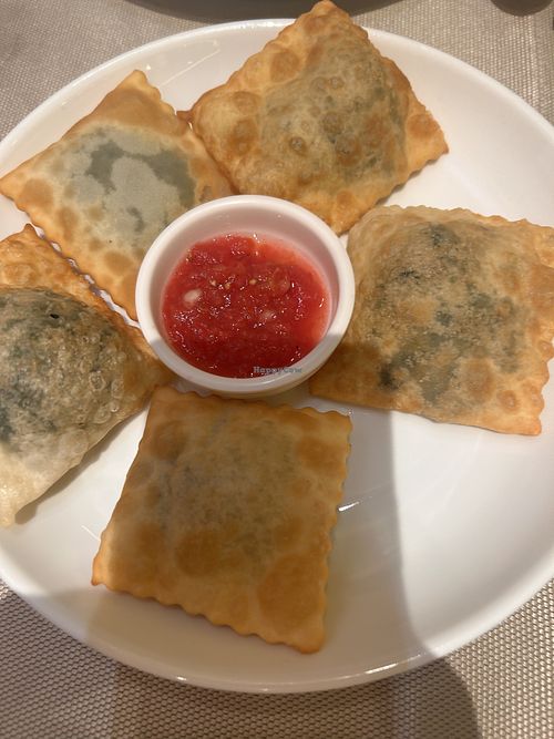 Hot appetiser with spinach filling   at Joy Chaikhana Lounge  in Bukhara