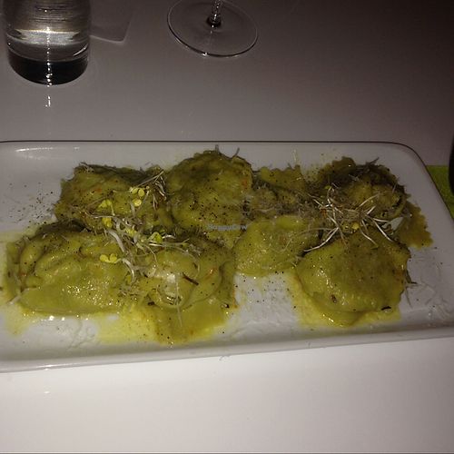Handmade truffle pasta served with orange butter and Parmesan (vegetarian) at The Green Garden in Salzburg