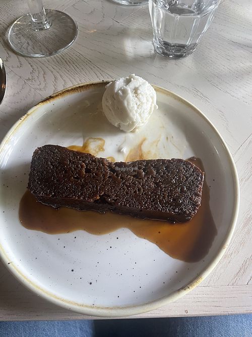 Vegan sticky toffee pudding + vanilla ice creamm  at The Three Blackbirds in Newmarket