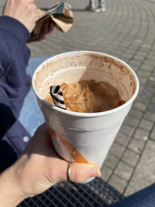 I put tons of cinnamon in my iced latte 😂  at Starbucks  in Frankfurt