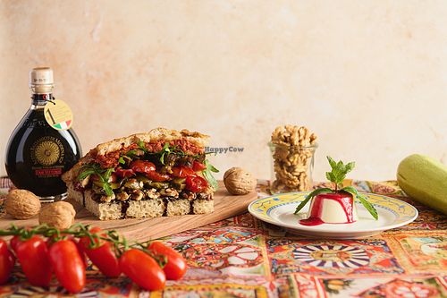 Our Vegan Combo. A plant-based combo featuring our vegan focaccia and a soy-oat panna cotta with raspberry coulis. at La Posata in Frederiksberg