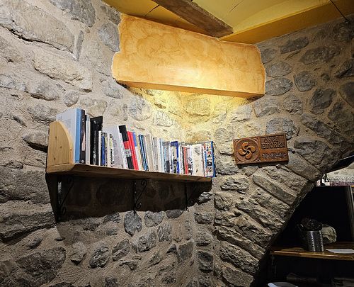 Book motif. at Pizzeria La Roda Groga in Besalu