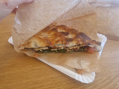1/2 of the focaccia sandwich (i already ate the other one), full of taste and delicious!!! at Alessio's Delicatessen in St Moritz