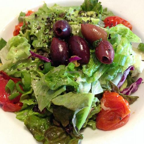 Greek Salad, no feta. Soo... good, and I don't normally even like salad.  at Spin Neapolitan Pizza in Orange