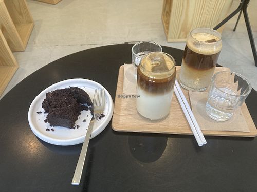 Delicious brownie big enough to share, & excellent oat latte & espresso tonic!  at East Cream Coffee in San Sebastian