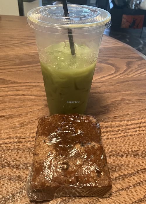 Matcha latte (with oatmilk and seasonal, house made apple brown sugar syrup!) and vegan pumpkin bread   at The Reister's Daughter  in Reisterstown
