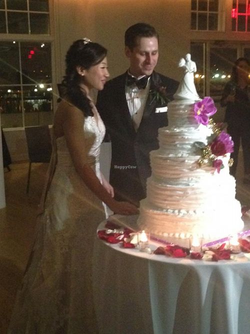 Chocolate and coconut five-tiered wedding cake at Rose Valley Cakes in Queens