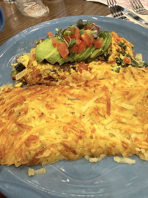 Farmhouse omelette - I took out the zucchini and bell pepper but still loaded with veggies. Not pictured - sourdough bread that comes dry, I spread it with avocado!    at The Breakfast Club in Livermore