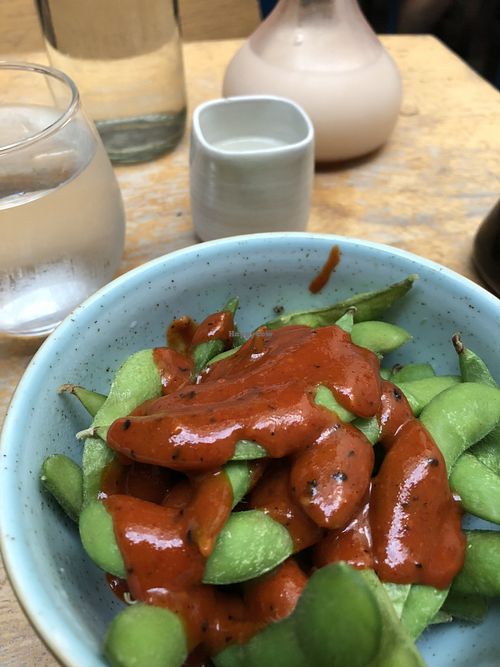 Edamame with spicy sauce.  at Feng Sushi - Borough Market in South East London