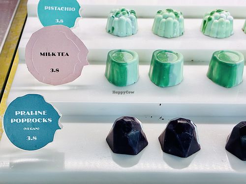 Chocolate display featuring vegan-friendly praline poprocks.   at Janice Wong at the Supertree in Central Singapore